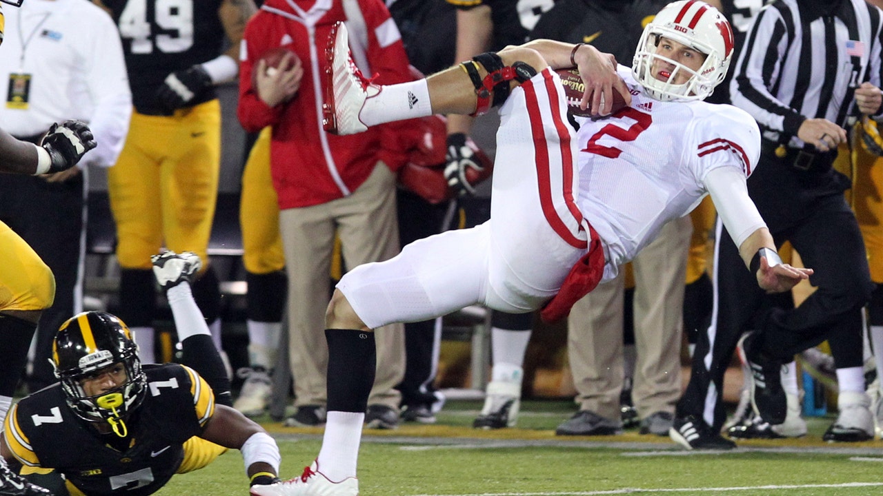 Stave stands tall, helps Wisconsin slip past Iowa